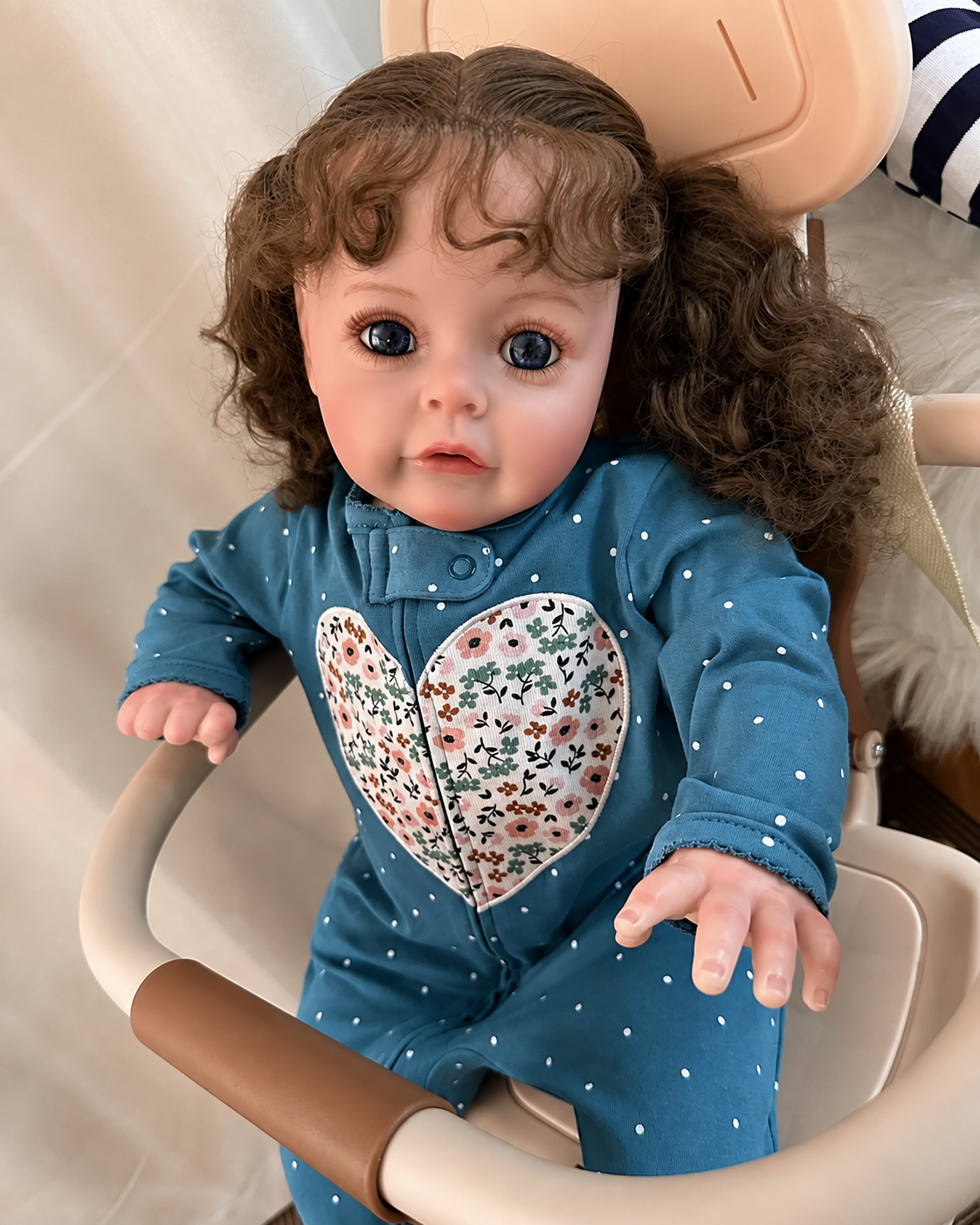 Poppy 24-Inch Reborn Baby Girl Doll – Realistic Toddler with Blue Eyes and Hand-Implanted Curly Hair