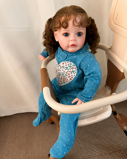 Poppy 24-Inch Reborn Baby Girl Doll – Realistic Toddler with Blue Eyes and Hand-Implanted Curly Hair