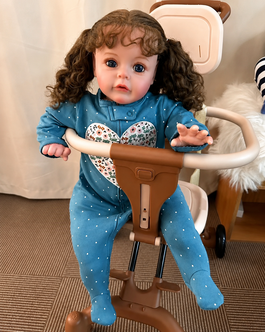 Poppy 24-Inch Reborn Baby Girl Doll – Realistic Toddler with Blue Eyes and Hand-Implanted Curly Hair