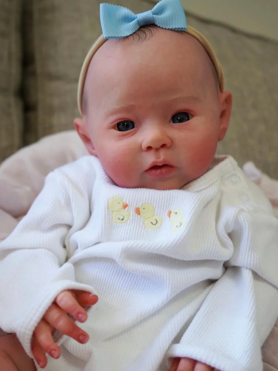 Kirra 20-Inch Reborn Baby Girl Doll – Full Vinyl Baby with Open Blue Eyes and Hand-Painted Hair